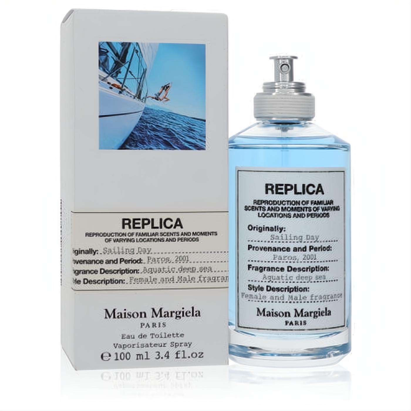 Experience Replica Sailing Day 3.4 oz EDT. Clear glass bottle with refreshing blue fragrance, elegant white box featuring a sailboat.