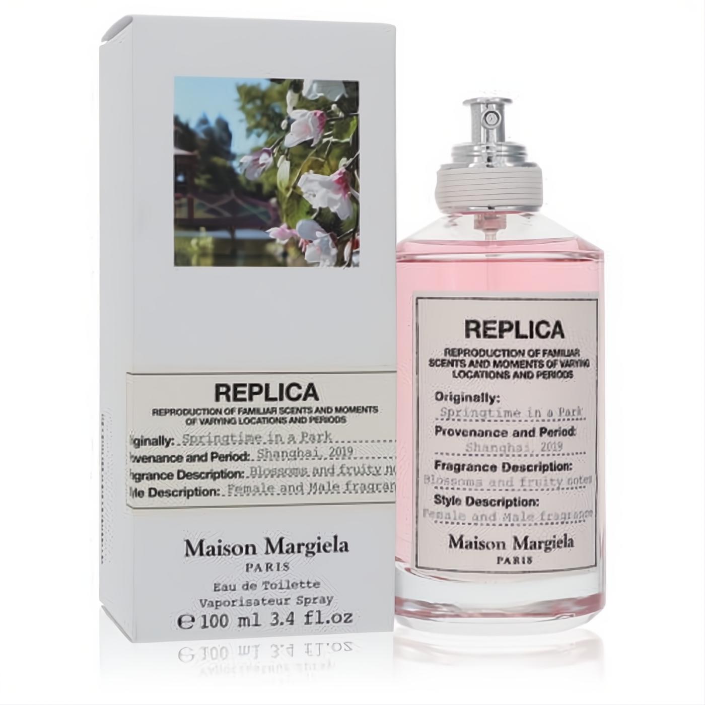 Experience Replica Springtime in a Park 3.4 oz EDT: a pink fragrance in a sleek glass bottle with its elegant white floral box.