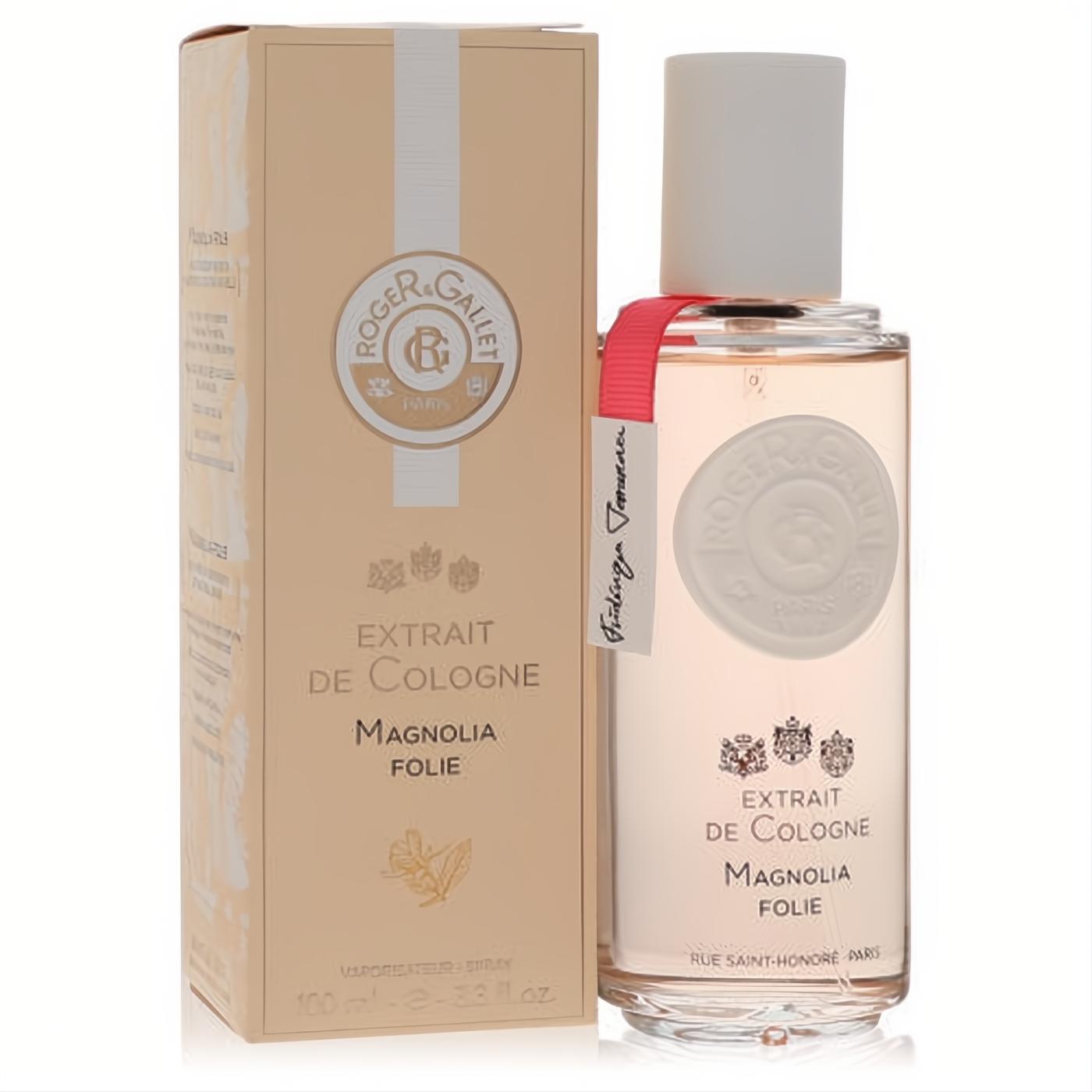 Elegant Roger & Gallet Magnolia Folie 3.3 oz Extrait De Cologne in a clear glass bottle with light pink liquid, white cap, and pink ribbon, next to its beige floral box.