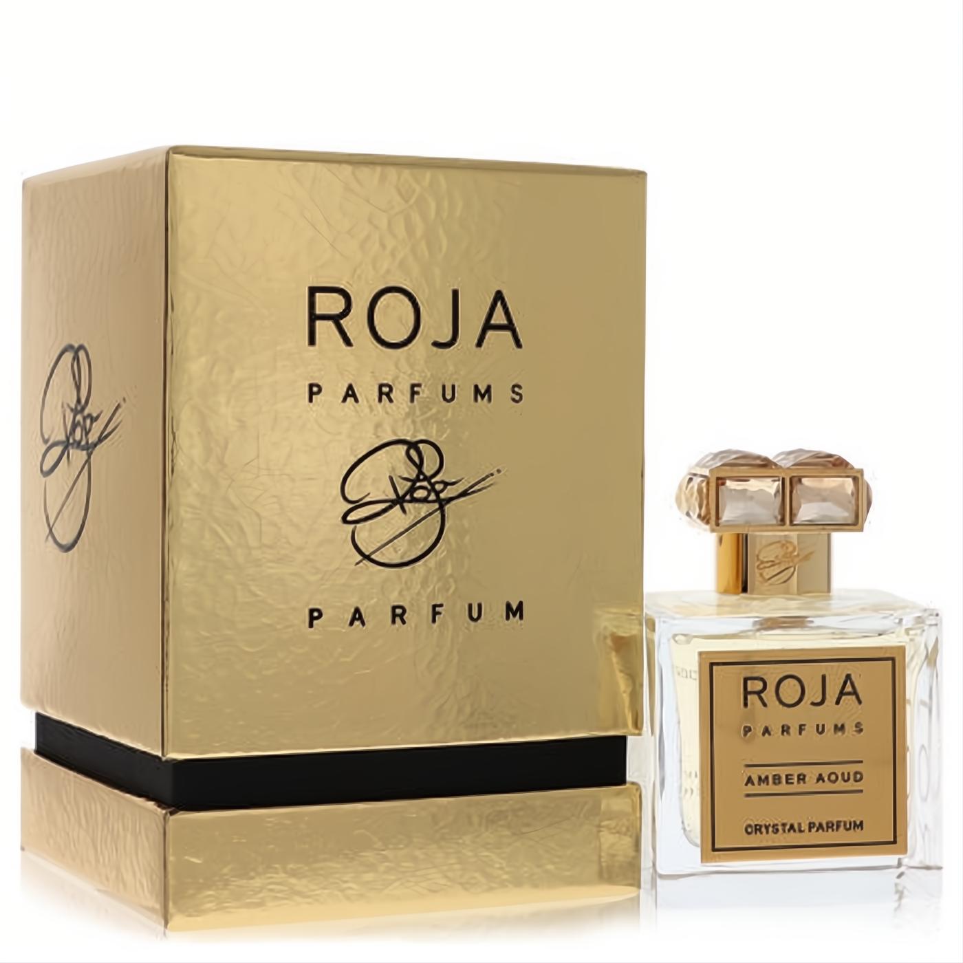 Elegant Roja Amber Aoud Crystal 3.4 oz perfume bottle with a golden label, ornate crystal cap, and shimmering gold box.