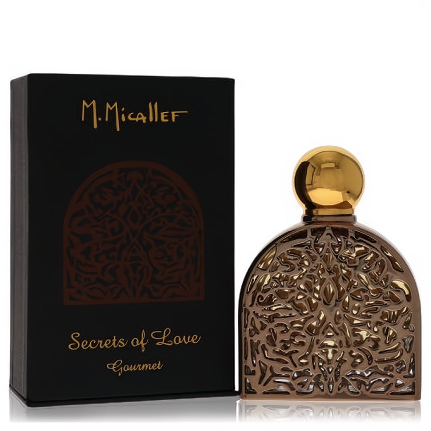 Seductive M. Micallef Secrets of Love Gourmet perfume. Ornate bronze filigree bottle, gold cap, and elegant black box with gold accents.