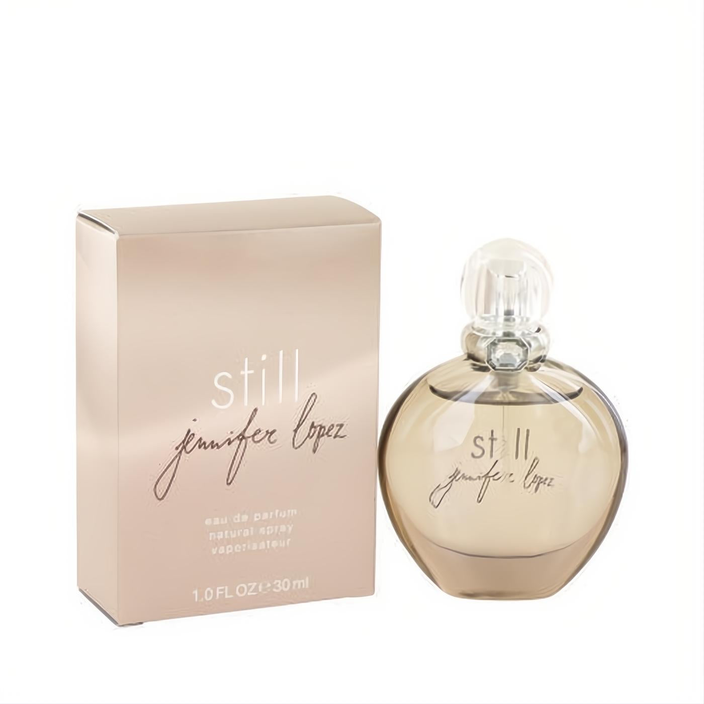 Still by Jennifer Lopez 1 oz Eau de Parfum spray. Elegant amber glass bottle and chic rose gold box.