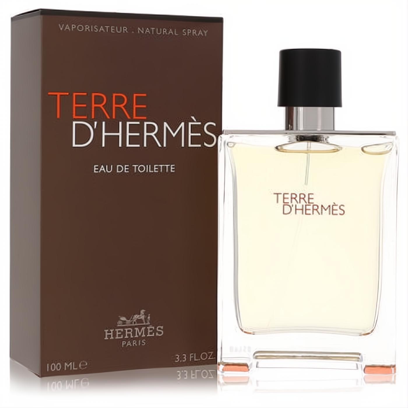 Terre D'Hermes 3.3 oz Eau De Toilette spray. Sophisticated clear glass bottle with black cap, beside its signature brown and orange box.