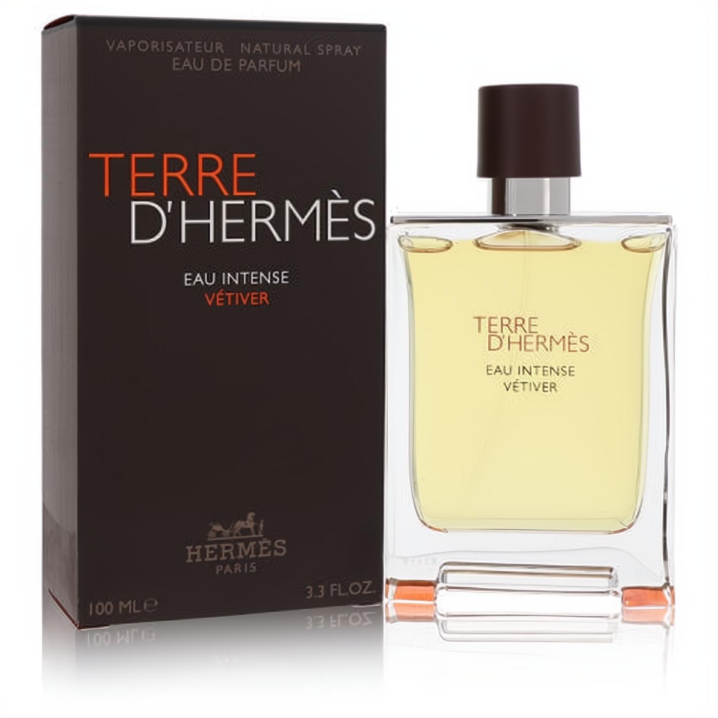 Hermes Terre D'hermes Eau Intense Vetiver 3.3 oz men's cologne. Clear rectangular bottle with amber liquid, dark brown cap, and matching box.