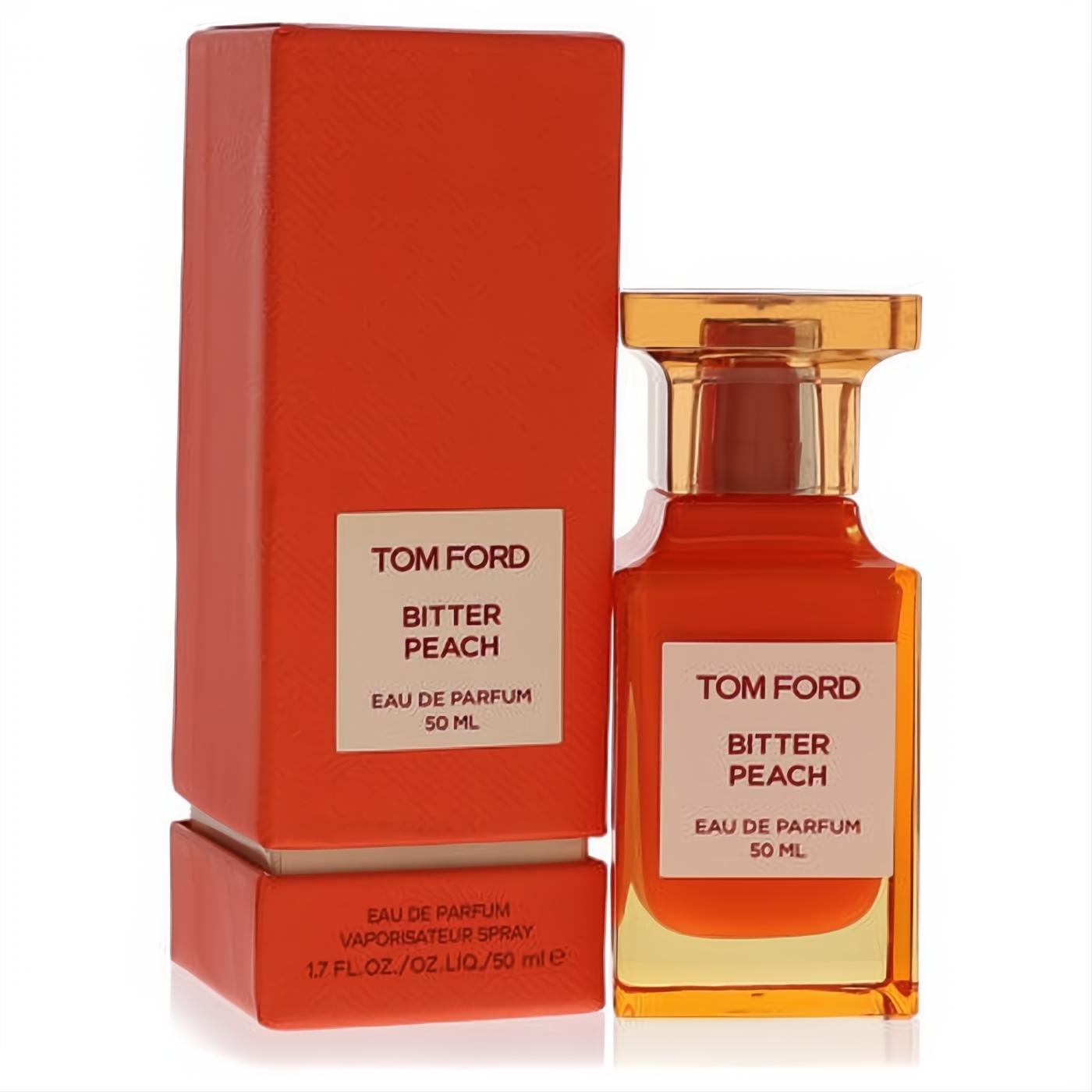 Luxurious Tom Ford Bitter Peach 50ml Eau De Parfum in a vibrant orange glass bottle with a ribbed gold cap, beside its elegant matching box.