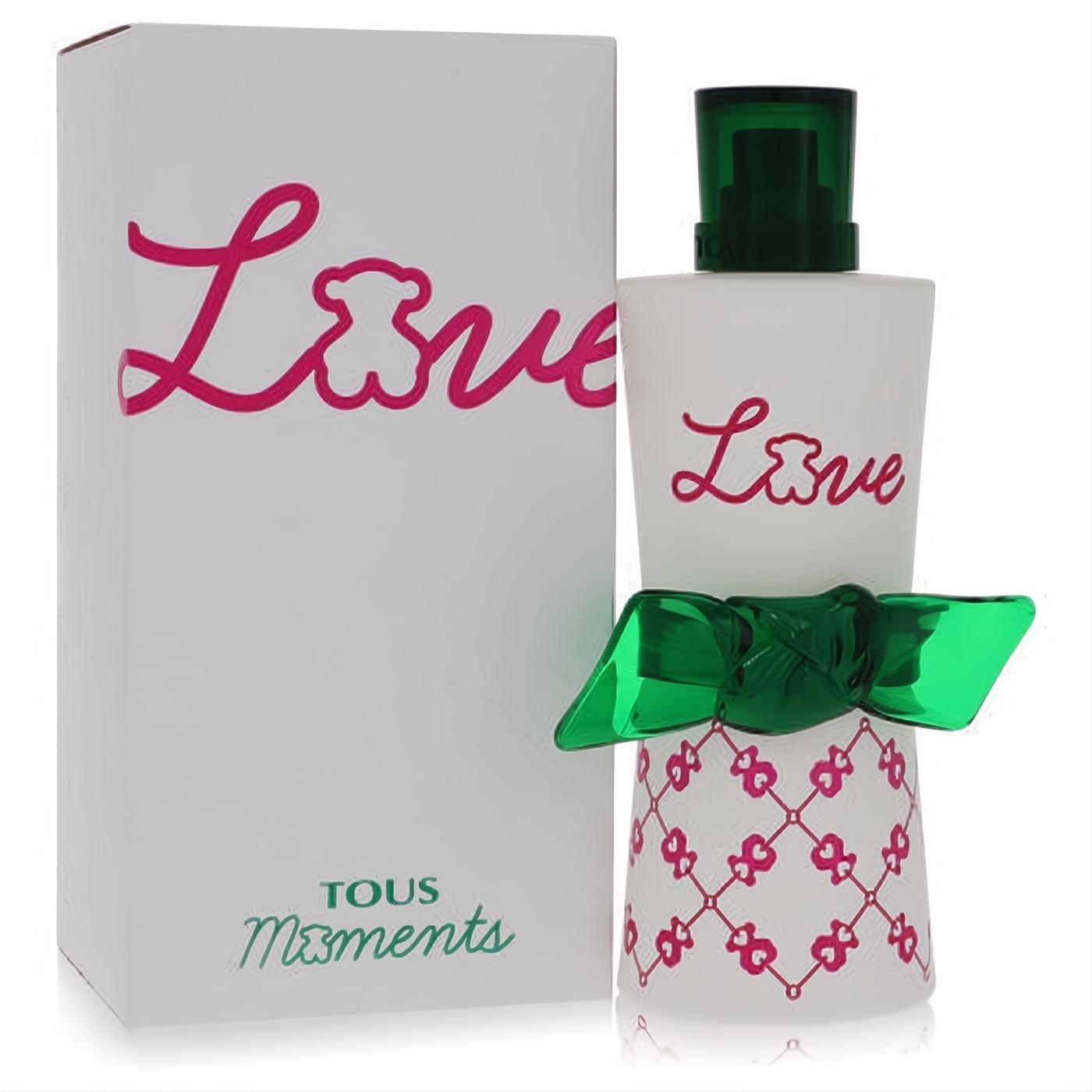 Tous Love Moments 3 oz perfume bottle with green bow, white box, and pink "Love" script.