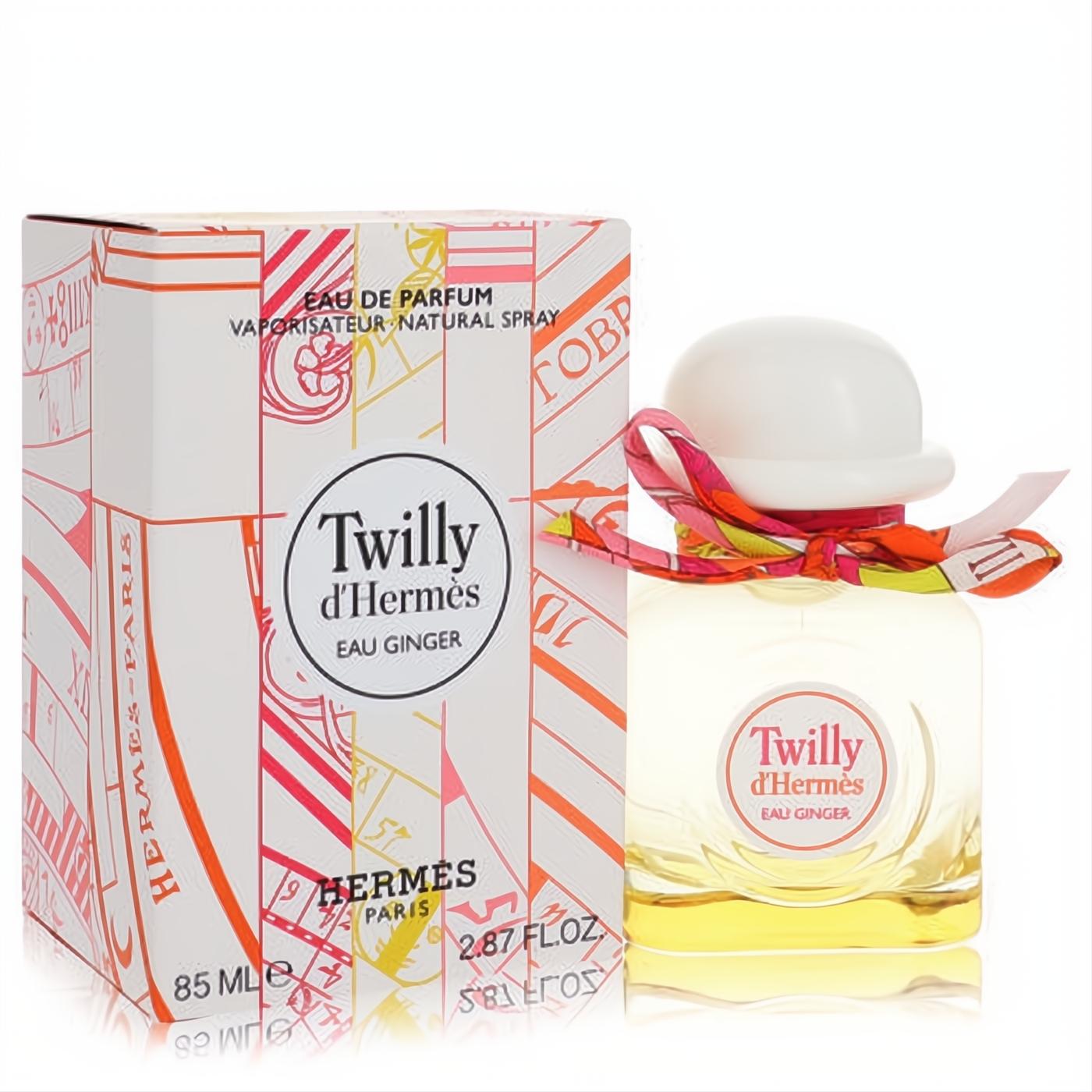 Chic Hermes Twilly d'Hermès Eau Ginger 2.8 oz EDP spray. Clear bottle, white bowler cap, vibrant silk twilly ribbon, matching patterned box.