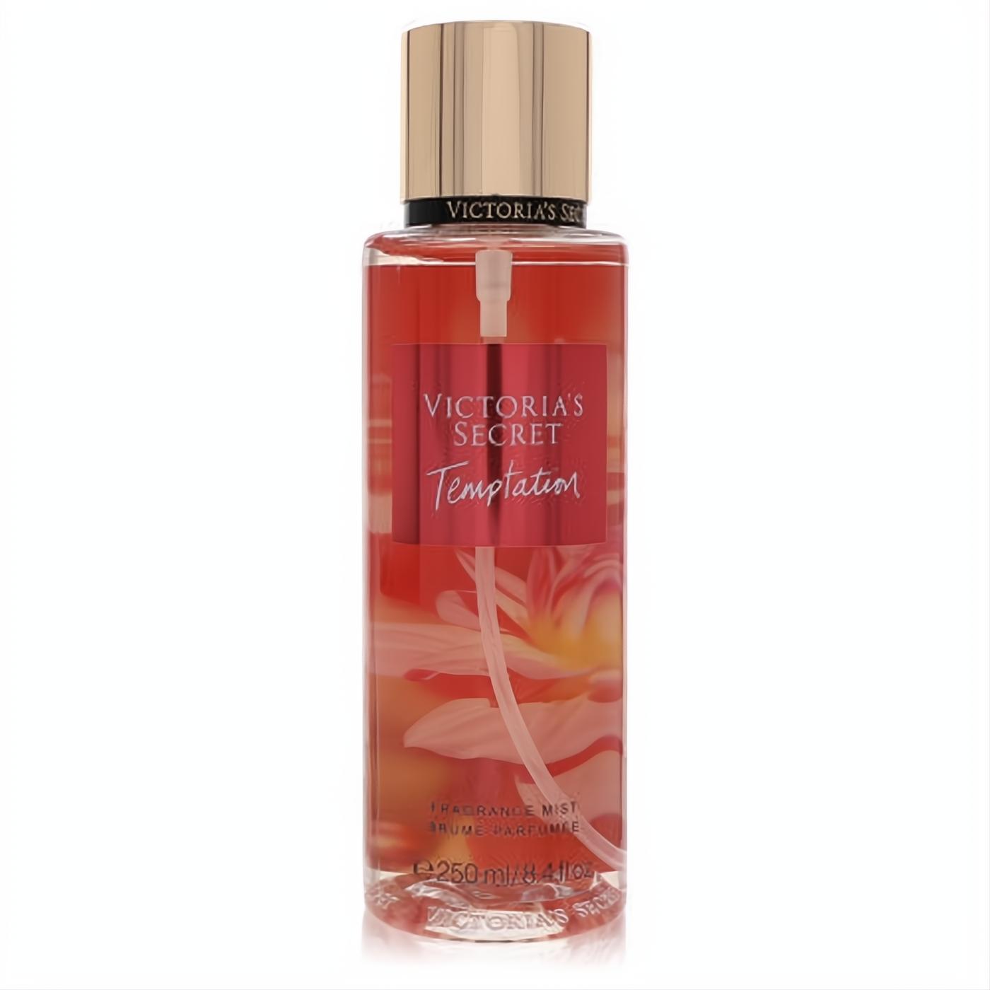 Victoria's Secret Temptation 8.4 oz fragrance mist: clear bottle, alluring red liquid, elegant gold cap, and beautiful floral design.