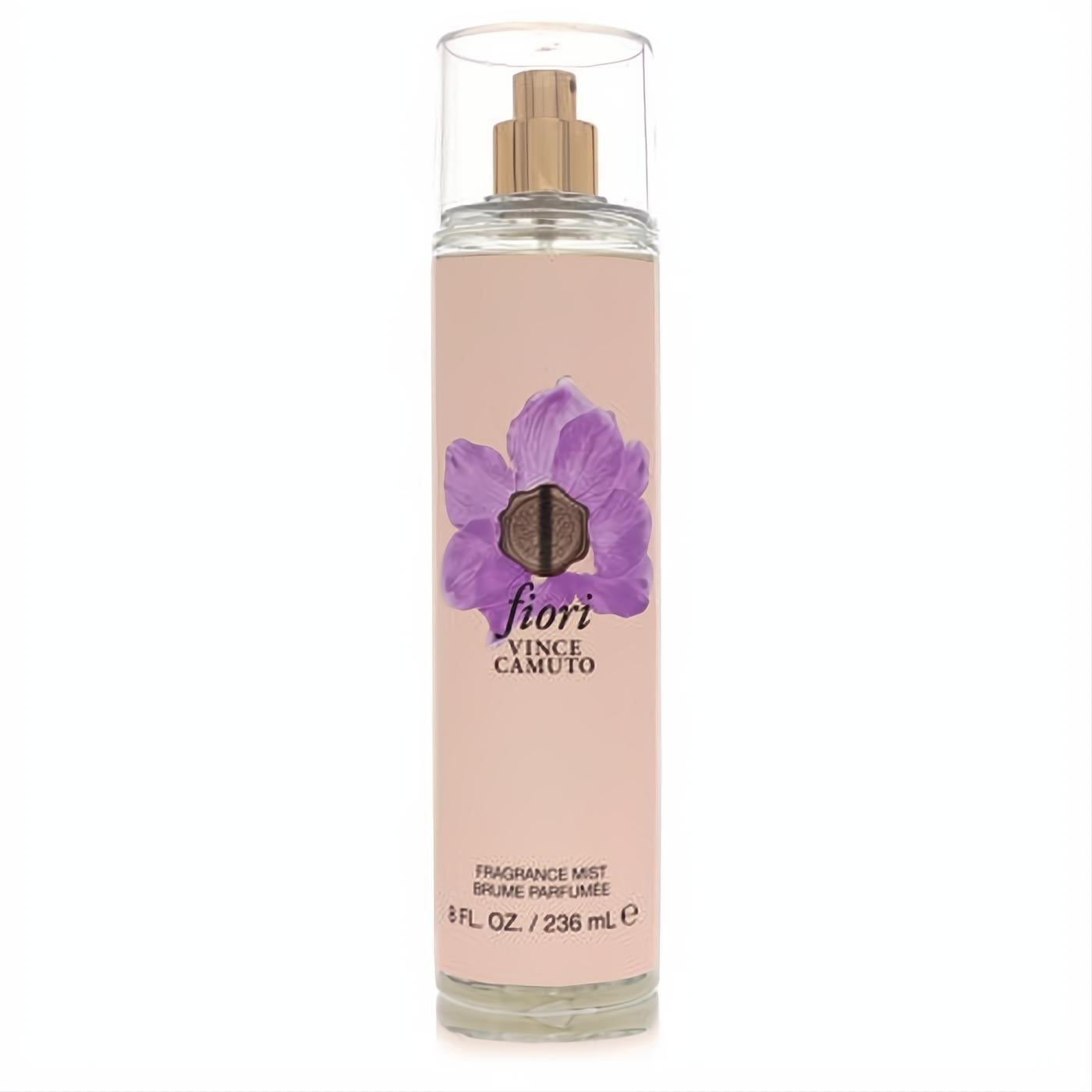 Elegant Vince Camuto Fiori 8 oz body mist. Clear bottle with a soft pink label, gold sprayer, and a beautiful purple floral design.