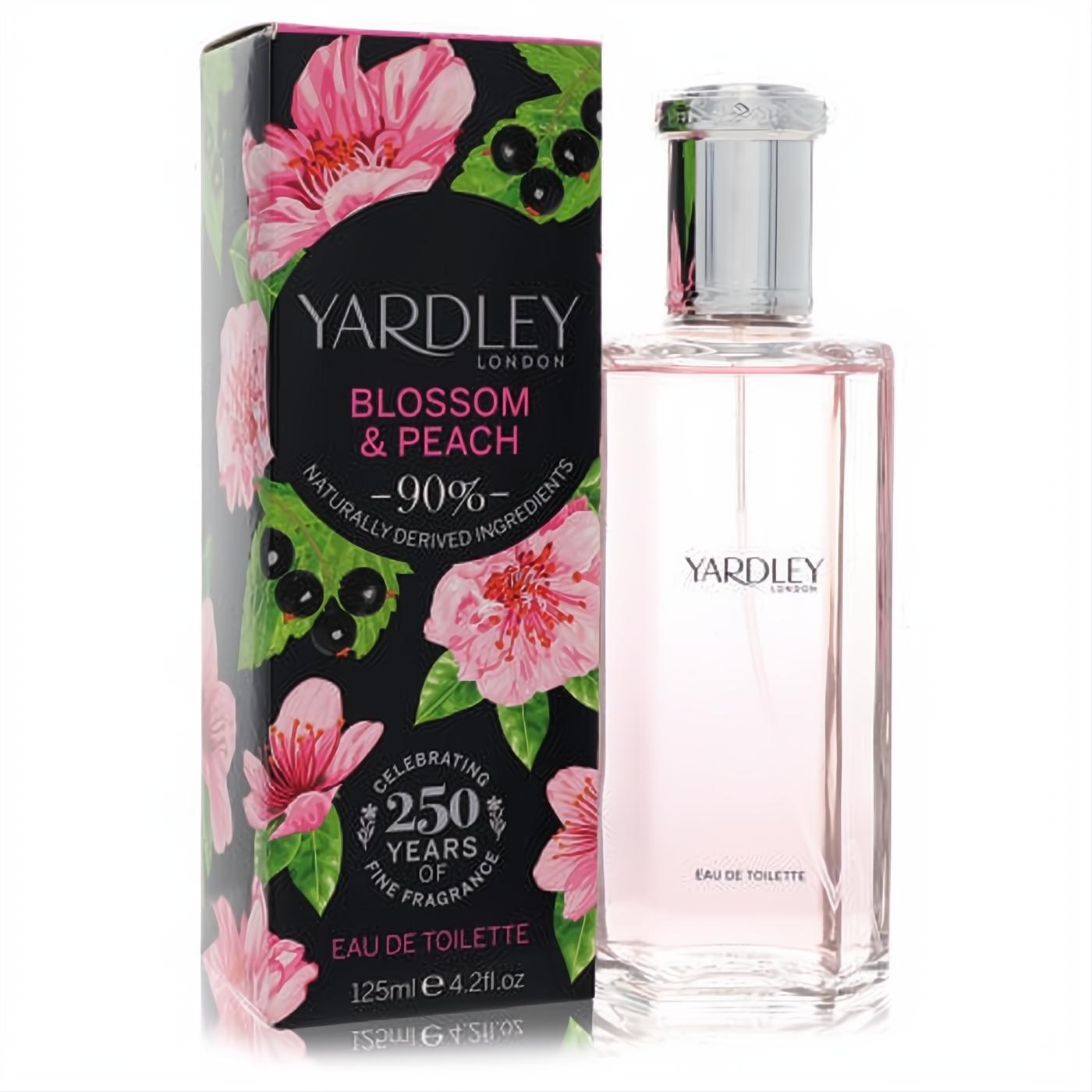 Yardley Blossom & Peach 4.2 oz EDT in an elegant clear bottle with pink liquid, beside its black box adorned with cherry blossoms.