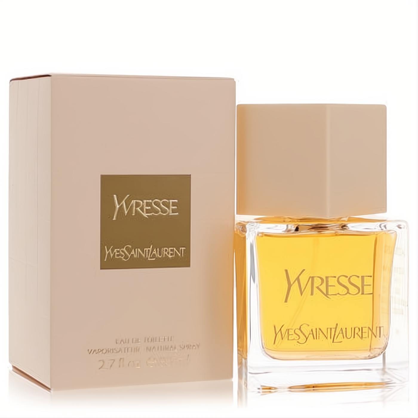 Elegant Yvresse by YSL 2.7 oz EDT spray. Golden fragrance in a chic clear glass bottle with a nude cap, beside its matching box.
