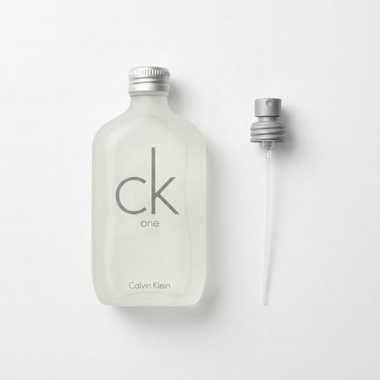 Fragrance bottle and spray nozzle — Flat Lay - Front | Generated by Modelize