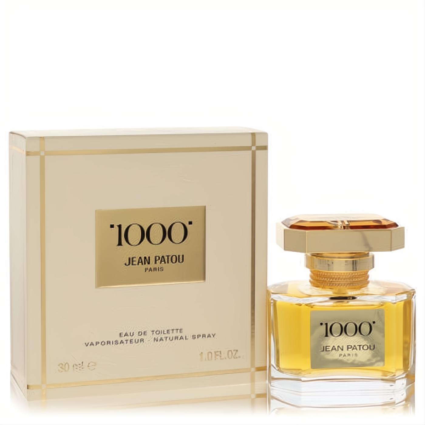 Luxurious Jean Patou 1000 Eau De Toilette 1 oz spray bottle with gold liquid and faceted cap, beside its elegant cream and gold box.