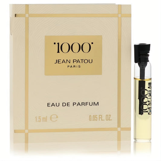 Experience Jean Patou 1000 Eau de Parfum with this elegant 0.05 fl oz sample card and clear glass vial of golden fragrance.