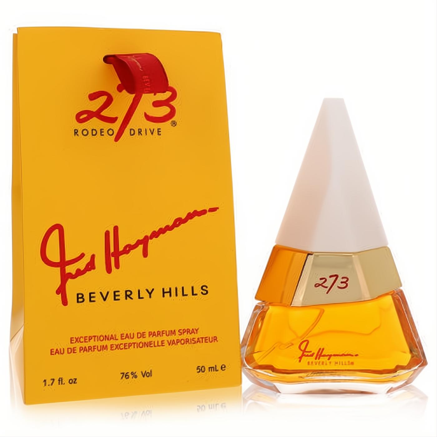 Fred Hayman 273 women's 1.7 oz Eau De Parfum. Distinctive pyramid bottle with gold accents, vibrant yellow box and red ribbon.