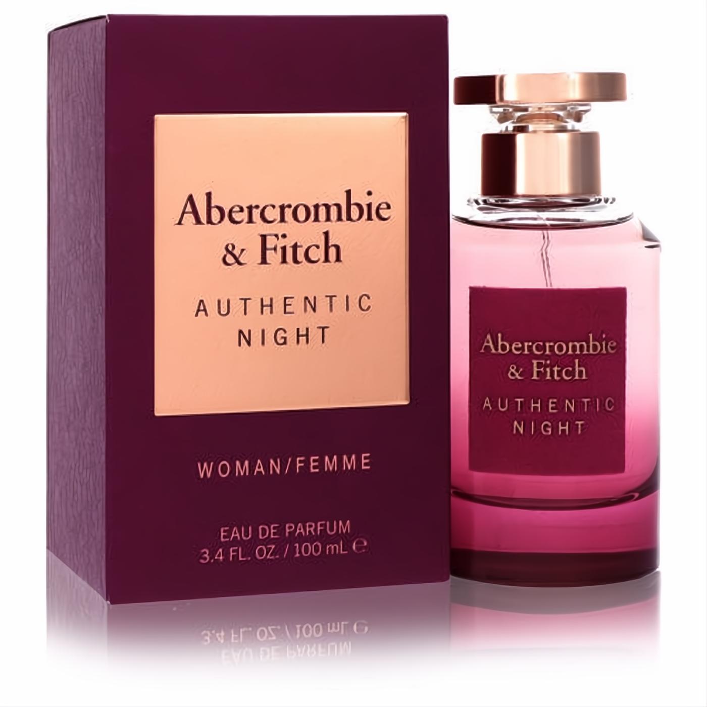 Captivating Abercrombie & Fitch Authentic Night 3.4 oz women's Eau De Parfum. Features a chic pink bottle, rose gold cap, and elegant burgundy box.