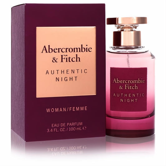 Captivating Abercrombie & Fitch Authentic Night 3.4 oz women's Eau De Parfum. Features a chic pink bottle, rose gold cap, and elegant burgundy box.