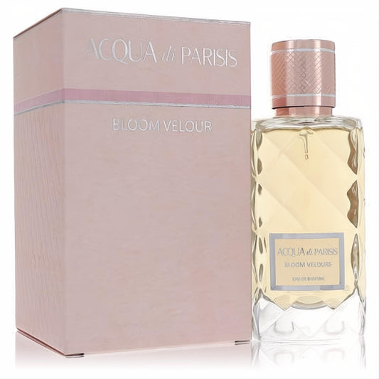 Acqua Di Parisis Bloom Velour 3.3 oz women's fragrance. Faceted glass bottle, golden liquid, rose gold cap, and blush pink box.