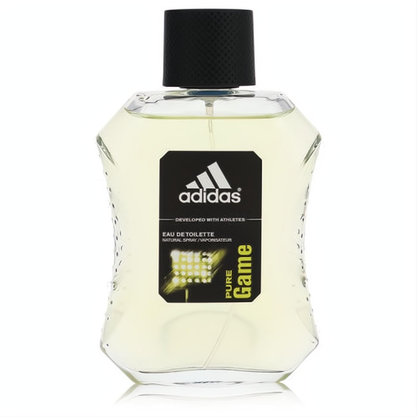 Energizing Adidas Pure Game men's EDT in a clear, athletic-design bottle with pale yellow liquid, black cap, and bold black and green label.
