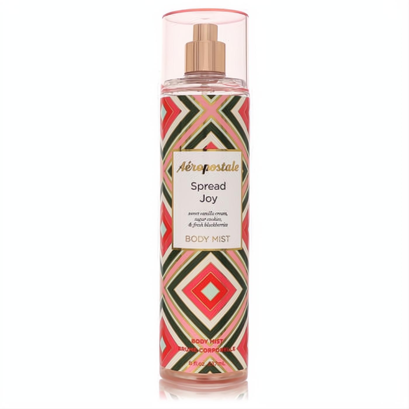 Aeropostale Spread Joy 8 oz body mist. Vibrant red, pink, green geometric label with a rose gold cap.