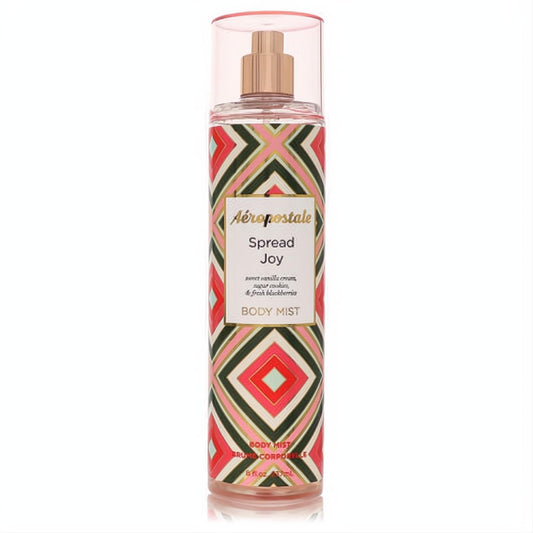 Aeropostale Spread Joy 8 oz body mist. Vibrant red, pink, green geometric label with a rose gold cap.