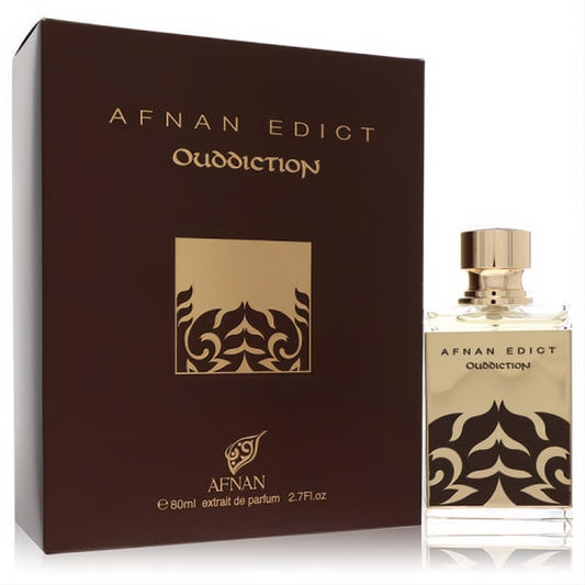 Luxurious Afnan Edict Ouddiction 2.7 oz unisex extrait de parfum. Elegant clear bottle with gold cap, ornate label, and rich dark brown & gold box.