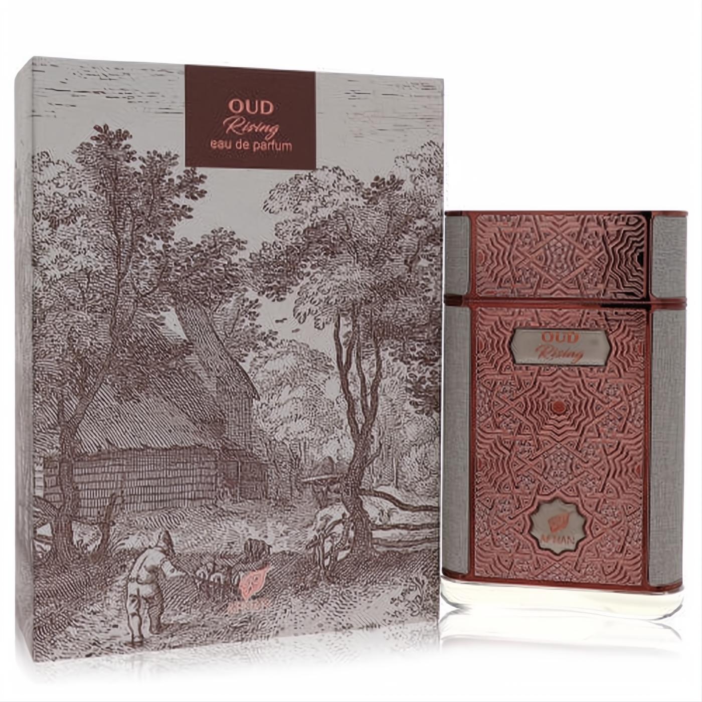Experience Afnan Oud Rising 2.8 oz EDP. Elegant rose gold bottle with intricate patterns, grey sides, beside its unique vintage-illustrated box.