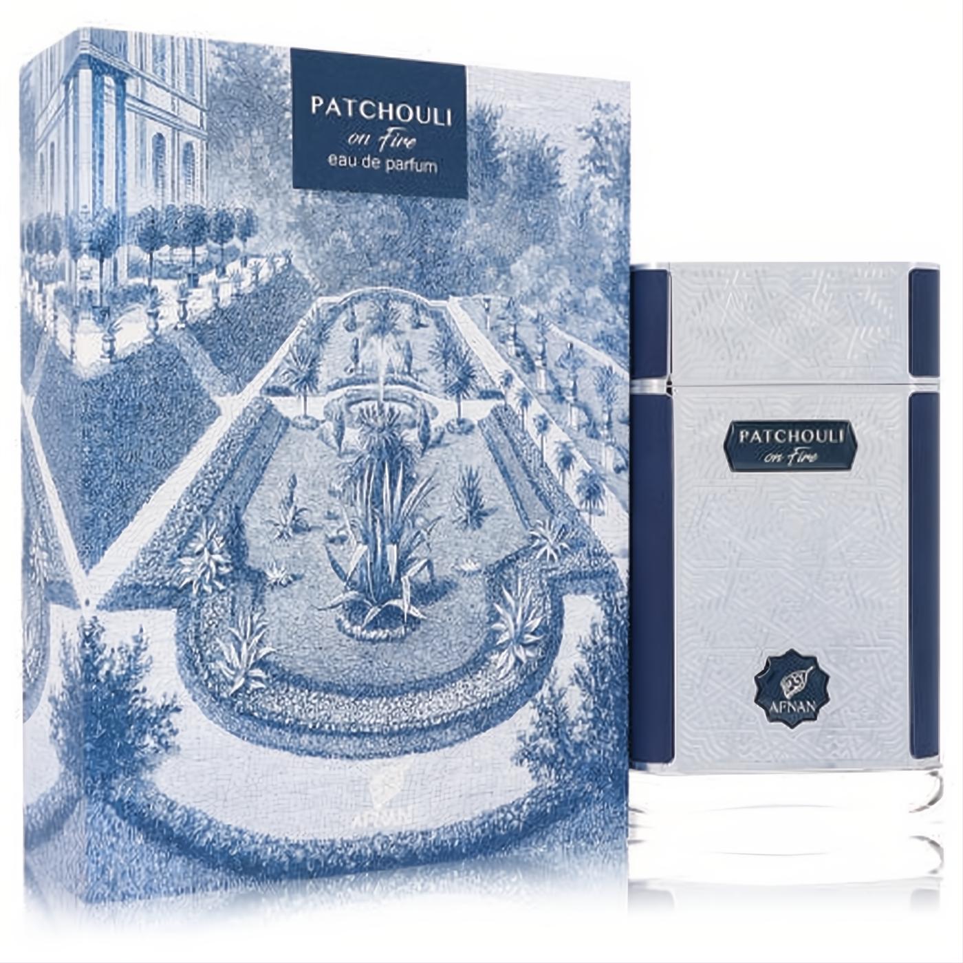 Afnan Patchouli On Fire 2.7 oz unisex EDP. Striking silver textured bottle with blue accents, beside a captivating blue garden box.
