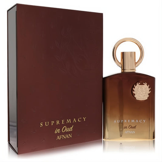 Afnan Supremacy in Oud 3.4 oz men's fragrance. Elegant ombre bottle with gold ring cap, luxurious burgundy box.