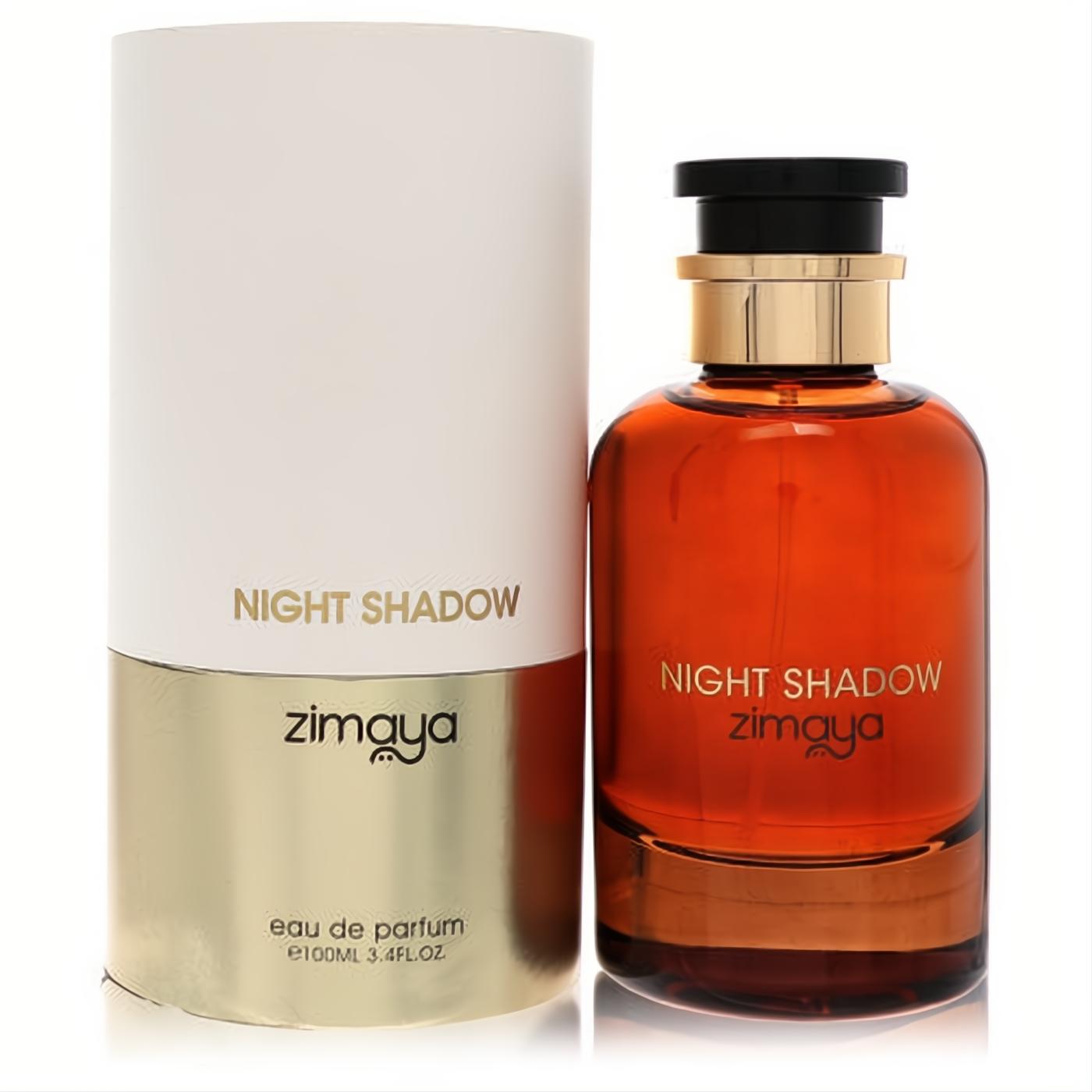 Captivating Afnan Zimaya Night Shadow 3.4 oz unisex EDP. Features a rich amber glass bottle with gold accents and a sleek white & gold box.