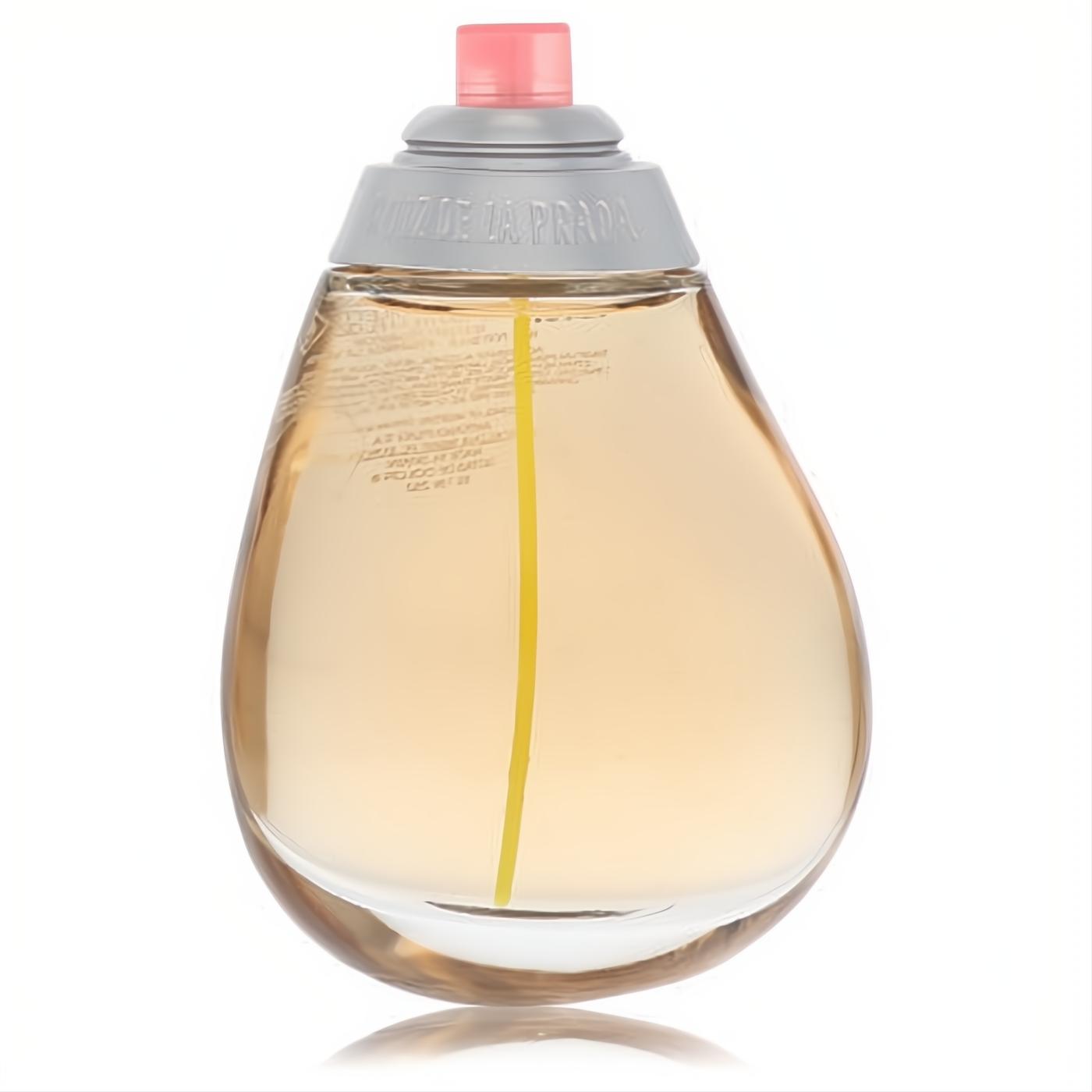 Agatha Ruiz De La Prada Gotas de Color 3.4 oz EDT. Elegant clear teardrop bottle, amber liquid, grey cap, pink sprayer.