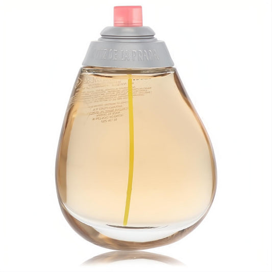 Agatha Ruiz De La Prada Gotas de Color 3.4 oz EDT. Elegant clear teardrop bottle, amber liquid, grey cap, pink sprayer.