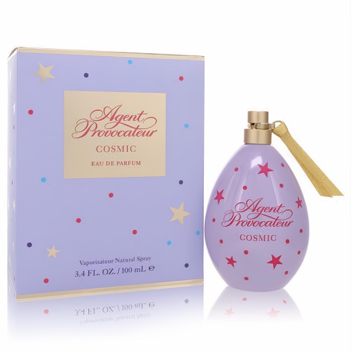 Agent Provocateur Cosmic 3.4 oz EDP. Captivating lavender egg bottle with gold cap, tassel, and red stars, beside its chic matching box.