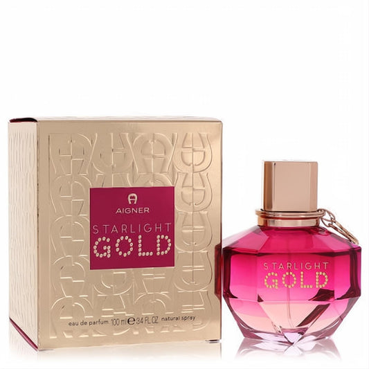 Aigner Starlight Gold 3.4 oz EDP, a radiant faceted fuchsia-pink bottle with a chic gold cap and elegant matching box.