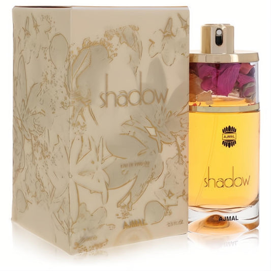 Luxurious Ajmal Shadow 2.5 oz women's perfume. Golden liquid bottle with unique petal-filled cap and elegant embossed floral box.