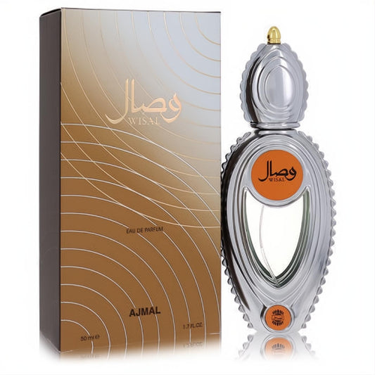 Ajmal Wisal 1.7 oz women's Eau De Parfum: luxurious silver ribbed bottle with gold cap, orange label, and elegant gold-silver patterned box.