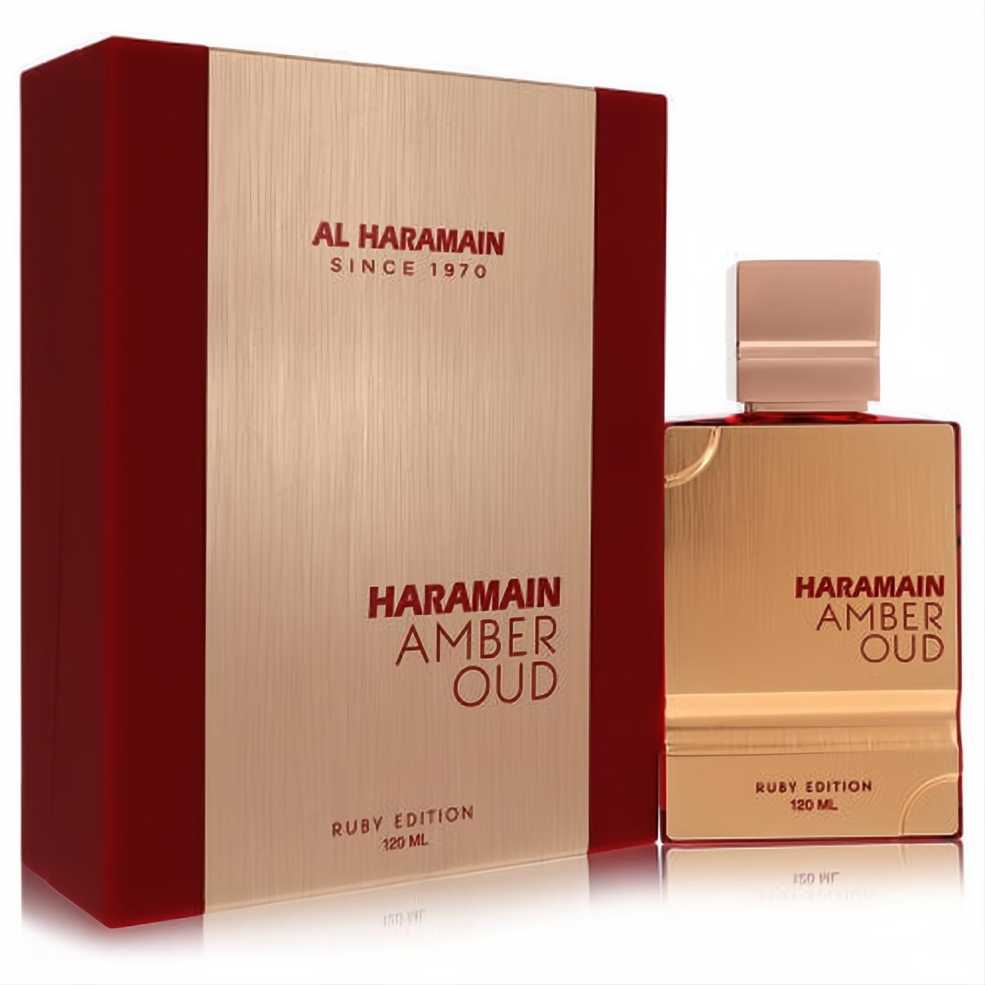 Elegant Al Haramain Amber Oud Ruby 120ml unisex EDP. Sleek gold bottle and matching ruby red box with gold accents.