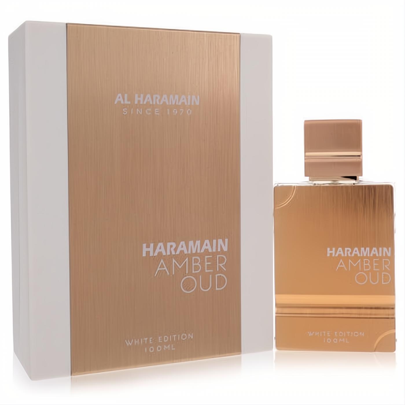 Al Haramain Amber Oud White Edition 100ml unisex eau de parfum spray. Elegant golden-hued bottle and box with crisp white accents.
