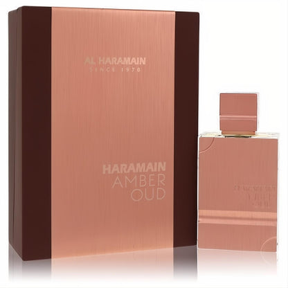 Al Haramain Amber Oud 2 oz unisex EDP. Luxurious rose gold metallic bottle with subtle etched details and matching brown box.
