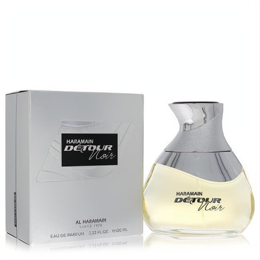 Al Haramain Detour Noir 3.4 oz unisex Eau De Parfum. Elegant clear glass bottle with unique silver cap and sleek silver box.