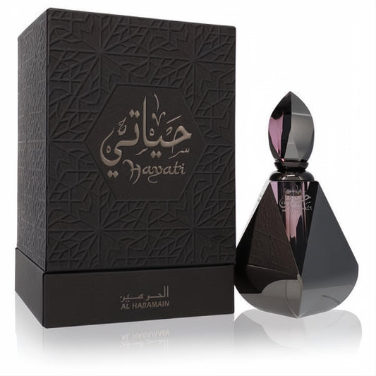 Al Haramain Hayati 0.4oz EDP. Dark, faceted bottle with a pointed cap, beside its elegant embossed black geometric box.