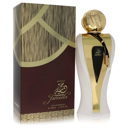 Al Haramain Jameela 3.4 oz perfume: elegant white and gold bottle with a ribbed cap, next to its luxurious brown and gold box.