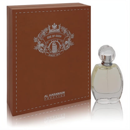 Discover Al Haramain Ode Of Oudh unisex perfume. Luxurious brown stitched box with silver crest and a clear, elegant glass bottle.