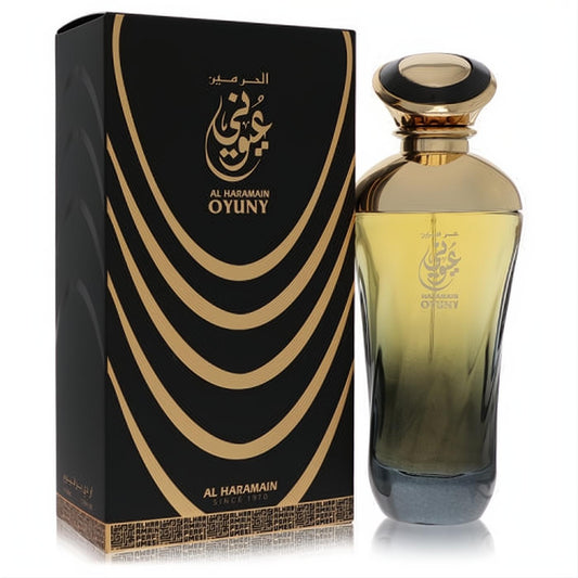 Experience Al Haramain Oyuny 3.3 oz unisex EDP. Stunning gold-to-dark gradient bottle, ornate cap, and matching black-gold patterned box.