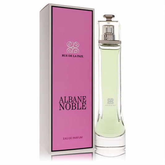 Albane Noble Rue De La Paix women's EDP. Elegant clear glass bottle with light green fragrance, next to a vibrant pink box.