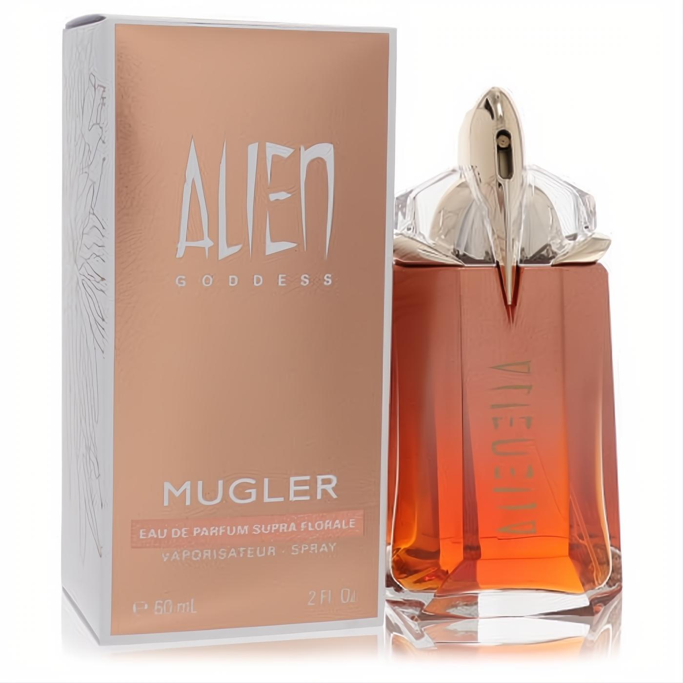 Alien Goddess Supra Floral 2 oz EDP. Radiant amber perfume in a stunning sculptural glass bottle with a unique gold cap, beside its elegant rose gold box.