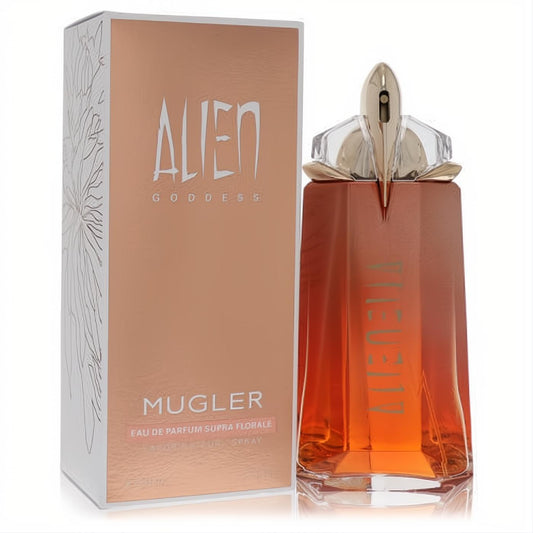 Alien Goddess Supra Floral 3 oz perfume. Striking amber bottle with a golden cap, paired with its elegant rose gold floral box.