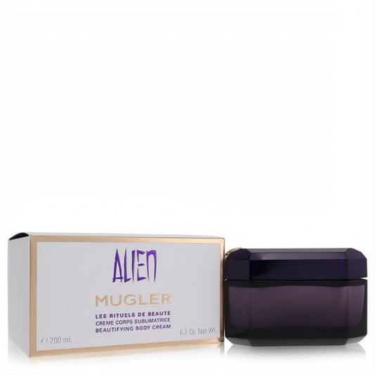 Indulge with Alien by Thierry Mugler Beautifying Body Cream. Luxurious dark purple faceted jar and elegant gold-accented box.