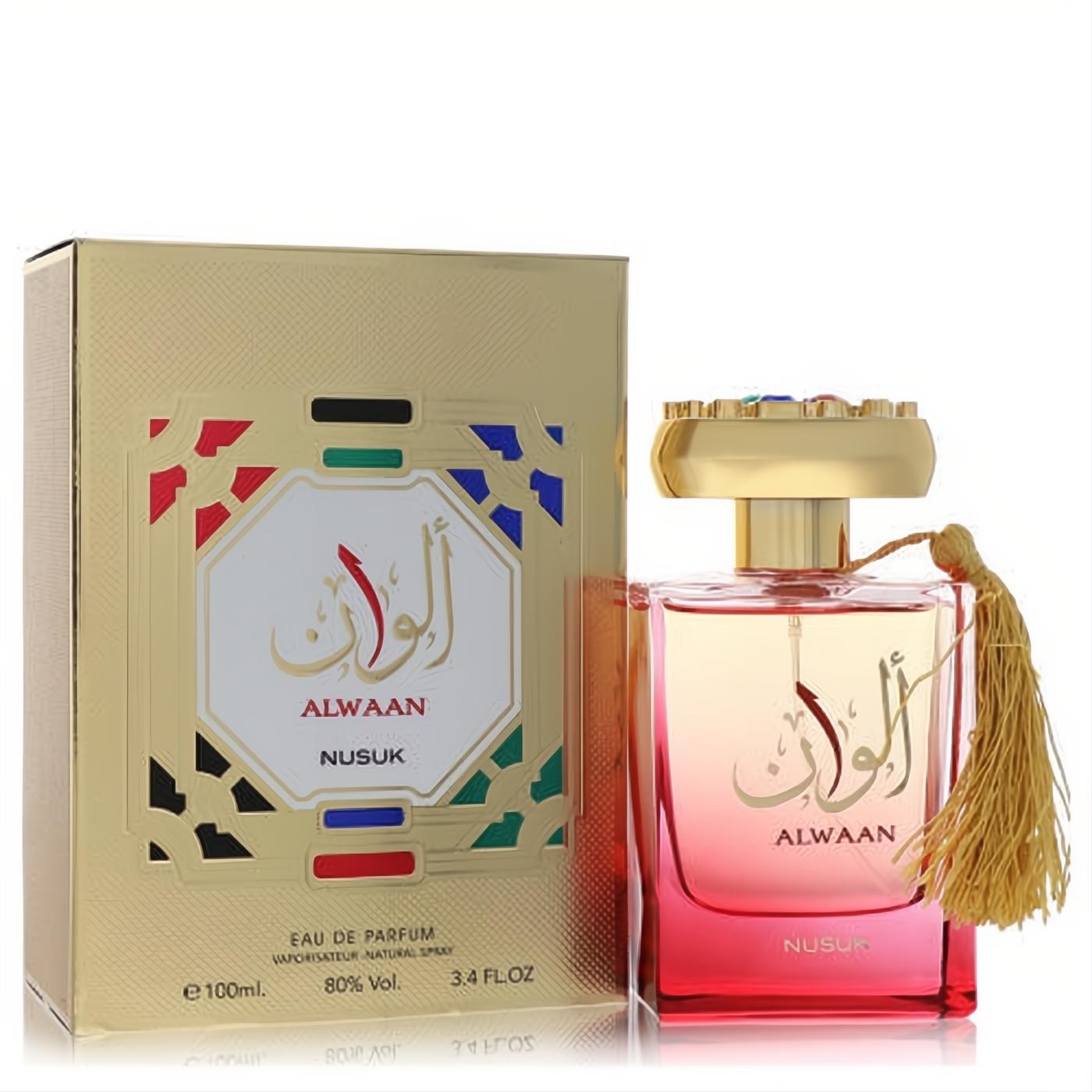 Alwaan by Nusuk 3.4 oz unisex EDP. Vibrant ombré red bottle, gold cap with tassel & jewels, beside a matching ornate gold box.