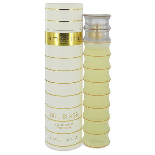 Amazing by Bill Blass Eau De Parfum spray, 3.3 fl oz. Elegant frosted bamboo bottle with golden liquid, beside a chic white and gold striped box.